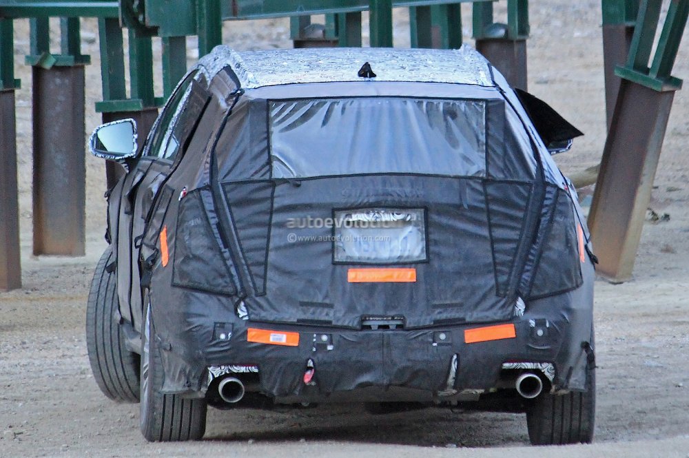 2016-cadillac-xt5-spied-will-replace-the-srx-photo-gallery_8.thumb.jpg.c5c9115d9e1721d66e76a0804cf3da5d.jpg